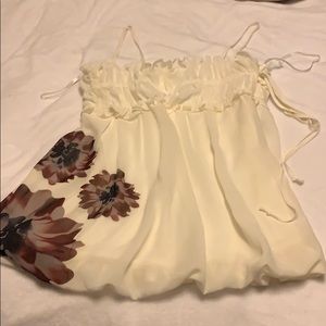 Cream spaghetti strap side zip dress shirt.